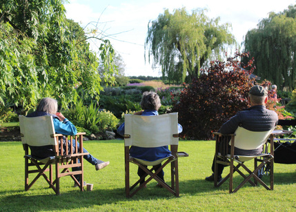 The Grange - contemplating view across to the prairie planting